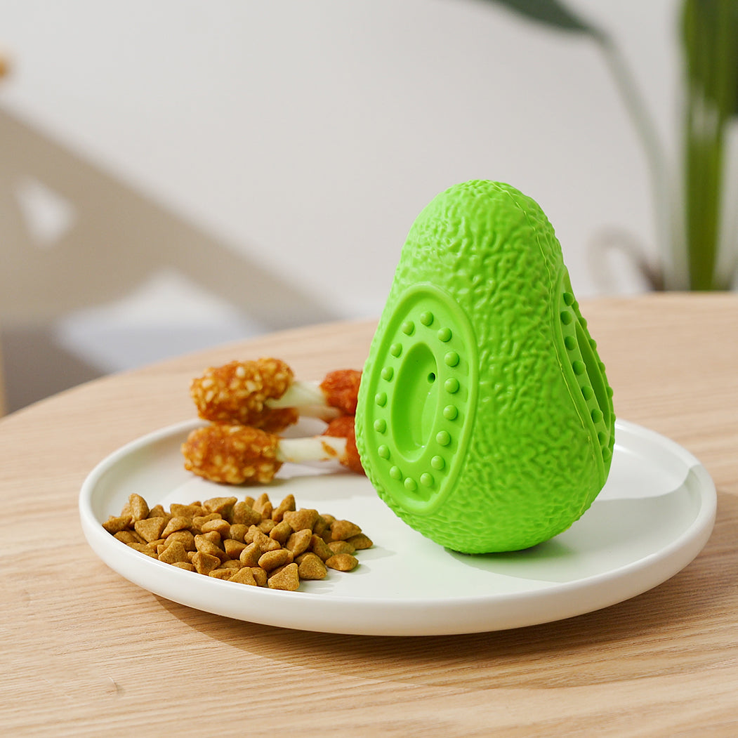 Close-up of Chewia Avocado Toy's treat dispensing feature